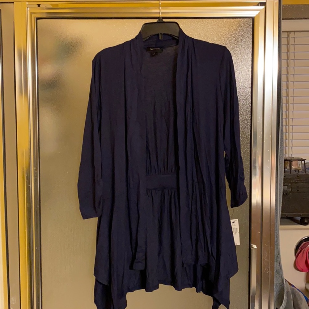 Elegant, comfy cardigan w/ruched sleeves. Cinched detail on back/dressy style